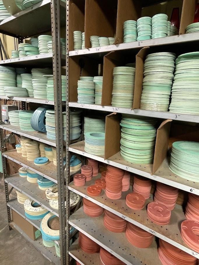 Shelves of pre-cut gasket blanks sorted by size at the B&B Hose shop in Chesapeake, VA